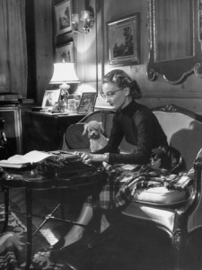 stackpole-peter-actress-pamela-curran-writing-on-typewriter